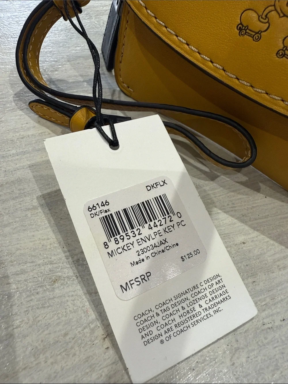 Coach Disney X Mustard Yellow Leather Mickey Wristlet